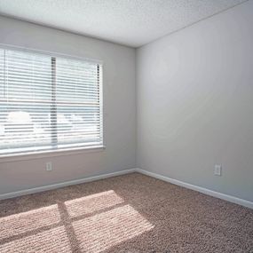 bedroom with natural light at beacon hill apartments