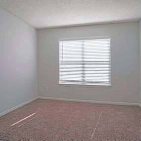 bedroom with window at beacon hill apartments