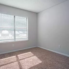 bedroom with natural light at beacon hill apartments