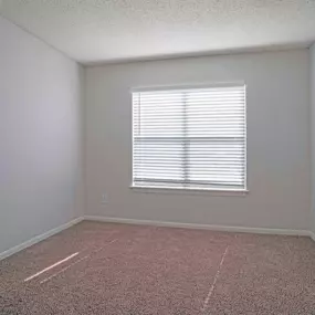 bedroom with window at beacon hill apartments