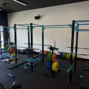 6 squat racks for heavy lifting.