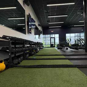 Turf area that stretches the length of the studio for running and lunges.
