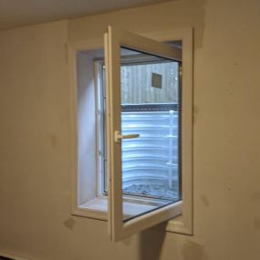 Egress Inswing Basement Window System Installation