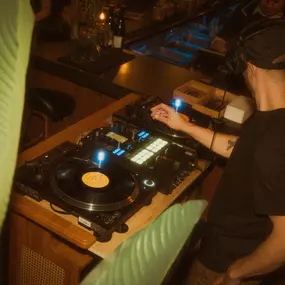 DJ playing vinyl in Flatiron