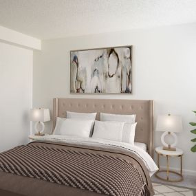 A bedroom with plush carpet flooring and a window with ample natural light.