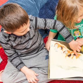 Children Reading at Nurturing Knowledge Preschool Greenwood, Seattle