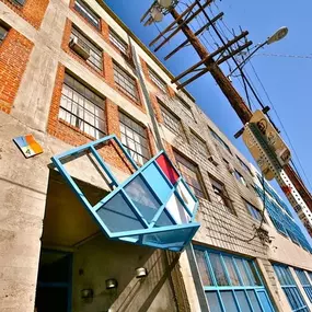 building facade with geometric pattern sign at Binford Lofts in Los Angeles, CA 90013