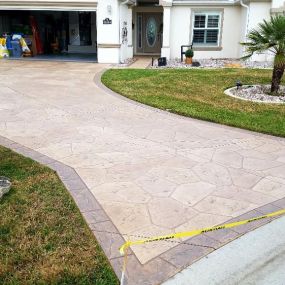 FLORIDA DECORATIVE CONCRETE & EPOXY offers professional stamped concrete installation to enhance the aesthetic appeal of your outdoor spaces. Our stamped concrete solutions provide the look of natural stone, brick, or other materials with the durability and versatility of concrete. Whether for driveways, patios, or walkways, our installations deliver a beautiful and long-lasting finish that adds value to your property.