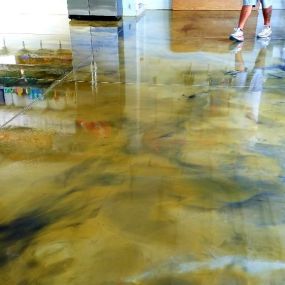 Enhance the durability and appearance of your floors with epoxy floor coating from FLORIDA DECORATIVE CONCRETE & EPOXY. Our epoxy coatings provide a seamless, high-gloss finish that is resistant to stains, chemicals, and abrasions, making them ideal for both residential and commercial applications. We are committed to delivering long-lasting results that protect and beautify your floors.