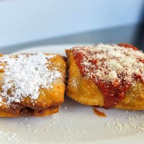 Fried Dough...Sweet or Savory!  Powdered Sugar, Cinnamon Sugar or Parmesan & Tomato Sauce.