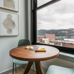 Table and chairs next to the window