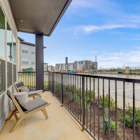 Ascend at Pioneer Hill - Balcony View Of Urban Apartment Complex