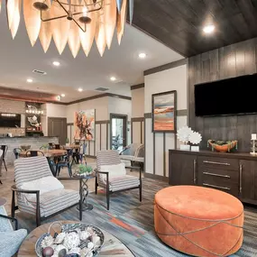 a living room filled with furniture and a tv at Sterling Creek