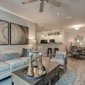 a living room with a couch and a table at Sterling Creek