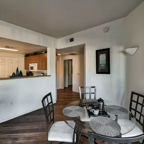 a dining room with a table and chairs at Desert Sage