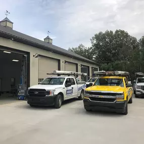 Absolute Overhead Door Service trucks