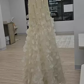 Beading wedding dress altered by TL Tailor & Bridal Sewing - Stillwater, Minnesota.