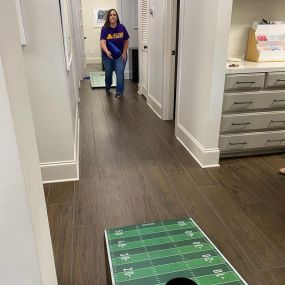 Wearing our purple & gold never gets old! Football season is back, and we are kicking it off with a team tailgate & corn hole fun! ???????? 
#thewilcoxway #nationalteamcolorsday