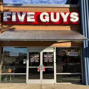 Exterior photograph of the Five Guys restaurant at 13620 Northeast 175th Street in Woodinville, Washington.