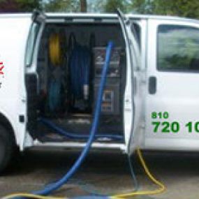 Atlas Cleaning Service work truck, Expert cleaning service in Flint, MI for carpet, wood, and upholstery.