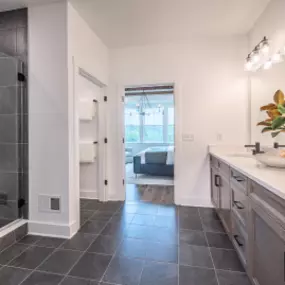 Elegant primary bath with dual vanity.