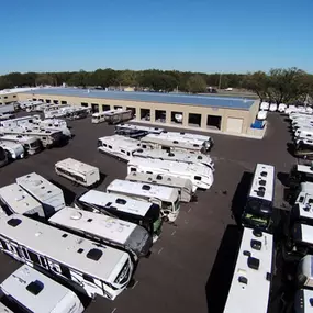 A shot of the service bays at our General RV Tampa location along with some of our new inventory.