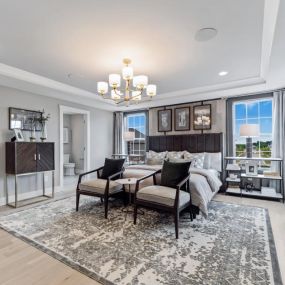 Large primary bedroom suites offer a luxurious bath and impressive closet space