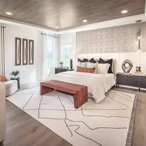 Large primary bedroom suites offer a luxurious bath and impressive closet space