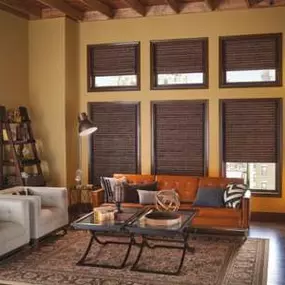 Transform your living room into a natural oasis with our stunning Signature Series Woven Wood Shades. Embrace the warmth and beauty of nature while adding a touch of sophistication to your space.