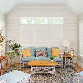 With our Shutters, you can transform a sunroom into a gorgeous second living space! See for yourself in the beautiful space featured in this image!