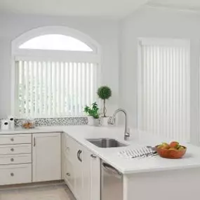 Introducing the best of both worlds! This space has it all—it’s bright and airy, but thanks  to our Vertical Blinds, it’s comfortably shady, too.  #BudgetBlindsKendaleLakes  #VerticalBlinds #FreeConsultation #WindowWednesday