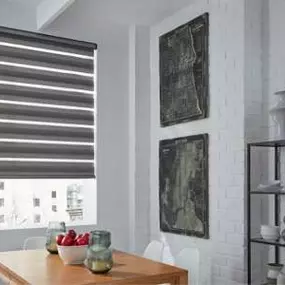 Let this dining space inspire you! Our Sheer Shades are featured here—and as you can see, not only do they filter light, but this particular pattern offers a lovely layered look!