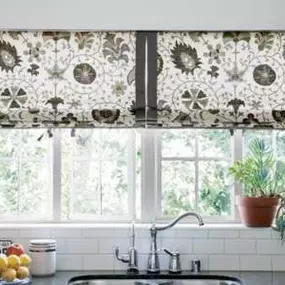 Enhance your home with the timeless elegance of Roman Shades! These versatile window treatments offer a sophisticated look while providing excellent light control and privacy. Available in a variety of fabrics and styles, Roman Shades can be customized to match any decor. Contact us today to explore