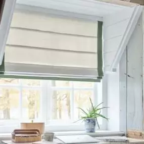 We can make all kinds of unusual spaces look amazing with our window coverings! Check out this rustic nook, which features our Roman Shades! It makes for a beautiful writing space!