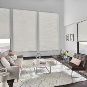 Introducing our stunning Signature Series Cellular Shades, the epitome of style and functionality for your living room! These exquisite window coverings effortlessly combine modern design with intelligent features to enhance your space like never before.