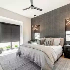 Want to sleep in? Don’t get out of bed to close the Shades! Try our Motorized Roller Shades instead! You can see them here in this perfectly coordinated bedroom!