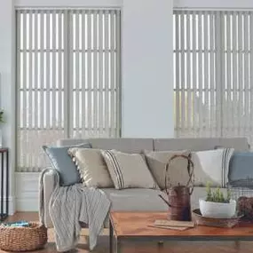 Elevate your living room style with Mera Window Fashions Vertical Blinds, where fashion meets functionality. These sleek and versatile blinds offer the perfect balance of privacy, light control, and contemporary design.