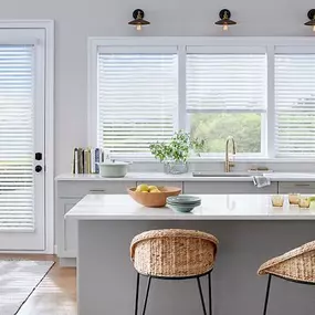 Our Faux Wood Blinds resemble the expensive look of real wood blinds but stand up against areas of high humidity and moisture, letting you choose the perfect window coverings for each room, especially bathrooms and kitchens.