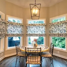 Here’s a breakfast nook draped in elegance! Our Roman Shades make a beautiful statement. Let us help you create Shades in the perfect pattern for your decor!