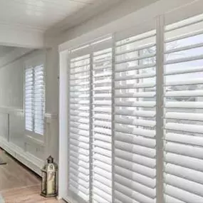 Wondering about the perfect window treatment for your sliding glass doors? Look no further. Plantation Shutters offer a world of versatility, elevating the aesthetics of your space while ensuring functionality. Imagine having the ability to regulate natural light, privacy, and room temperature with