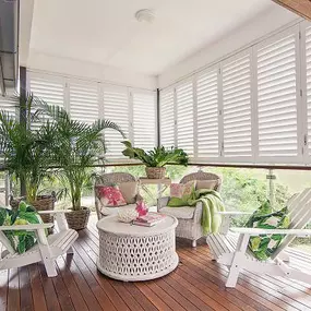 This balcony’s stunning transformation is completed with our versatile Aluminum Shutters  that block the harsh sunlight without making the room dark. Who wouldn’t want to sit  back and enjoy a quiet afternoon on this beautiful balcony?  #BudgetBlindsKendaleLakes  #AluminumShutters #ExteriorShutters