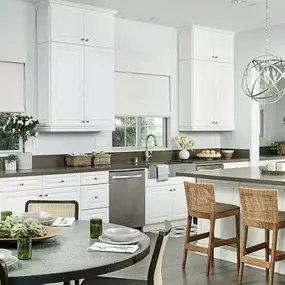 Our gorgeous Woven Wood Shades prove once again that you can’t go wrong with a clean, simple, and chic look. Check out how our shades add that extra oomph to this all-white kitchen.