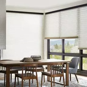 When you want a window covering that gives interior spaces a clean, sleek look, try our Cellular Shades. This living space is the perfect example of how these Shades can create smooth lines!