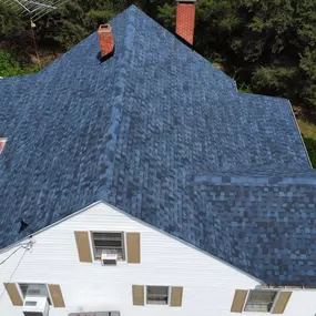 Roof replacement (After) with an Awesome looking Blue Roof in Yanceyville