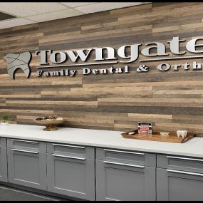 Towngate Family Dental and Ortho Logo on Wall at office