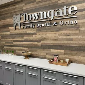 Towngate Family Dental and Ortho Logo on Wall at office