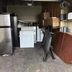 Clearing out old appliances and furniture is easy with Skunky's Junk Removal! Our clean out services are perfect for tackling garages, sheds, or any cluttered spaces.