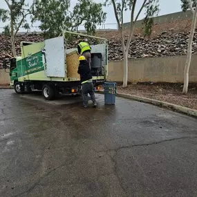 Skunky's Junk Removal team hard at work, handling junk removal services with efficiency and care. Whether it's a routine clean out or a larger project, we’ve got the team for the job.