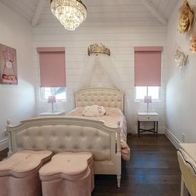 Look at these custom blush pink Norman Roller Shades that make this bedroom look  like a scene straight out of a Disney Film.  #BudgetBlindsEnfield  #RollerShades #NormanShades #FreeConsultation #WindowWednesday