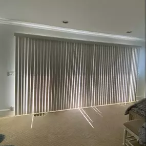 The before and after of these Vertical Blinds by Budget Blinds of Enfield on french doors says it all. Before: Glare and no privacy. After: A versatile solution that doesn't destroy the view. #BudgetBlindsEnfield #VerticalBlinds #BlindedByBeauty #FreeConsultation #WindowWednesday